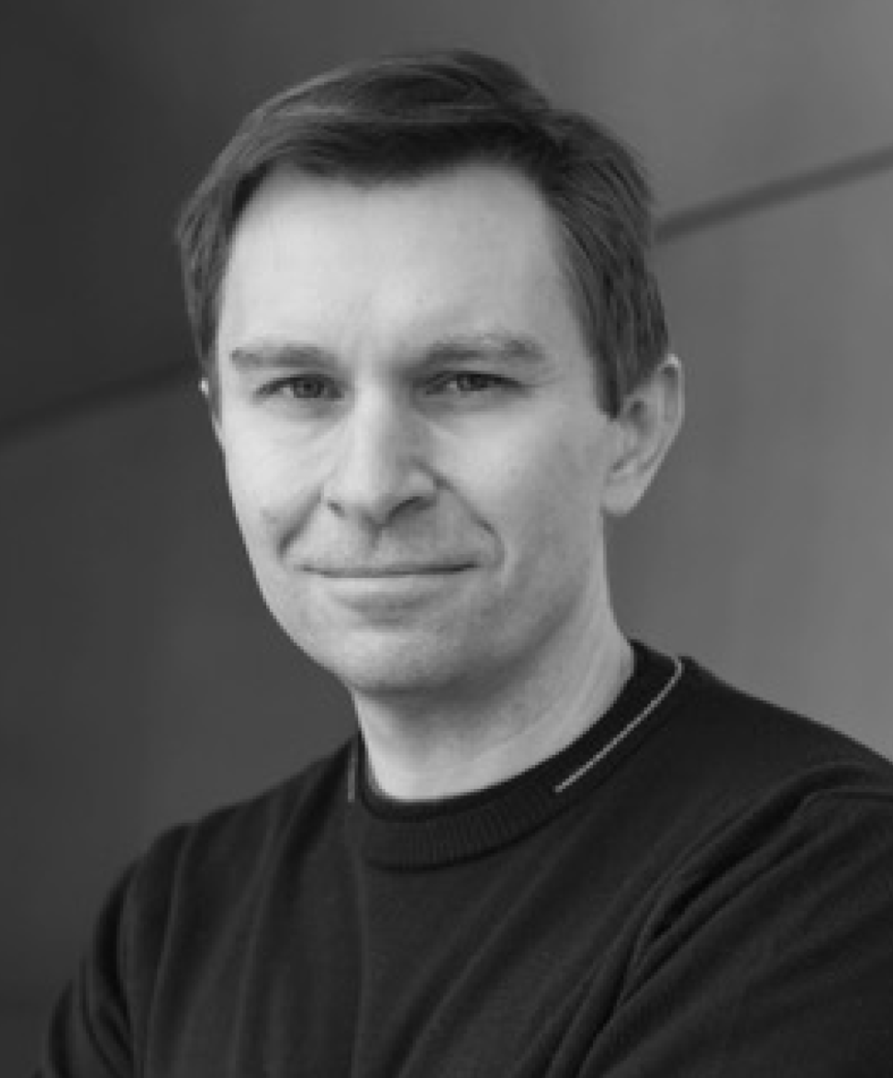 Black and white head shot of biologist and geneticist David Sinclair