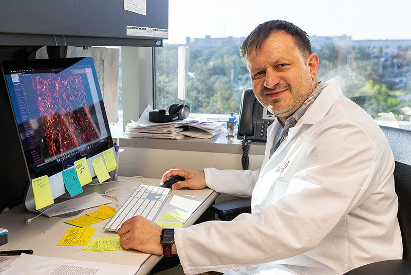 Cancer researcher Andriy Marusyk in his office at Moffitt