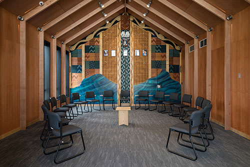 A photograph of a warm and cozy therapy room at Tiaho Mai.